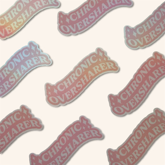 Stickers with 'Chronic Oversharer' text on a light background