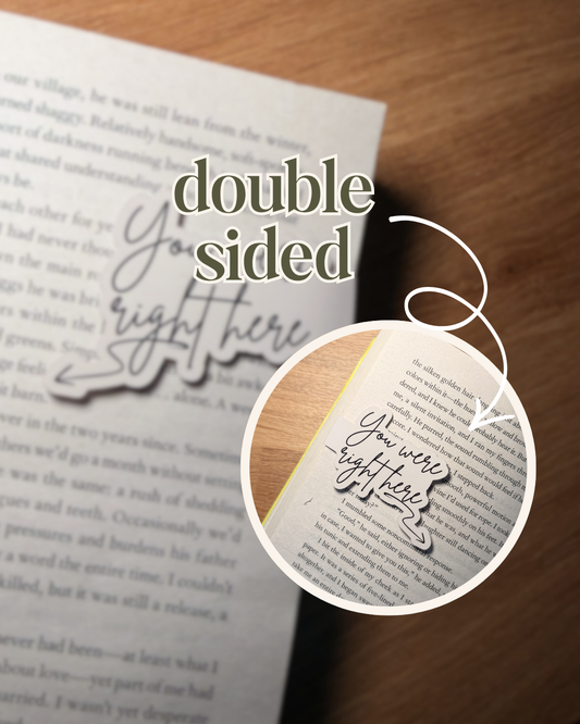 Double-sided bookmark with text on an open book