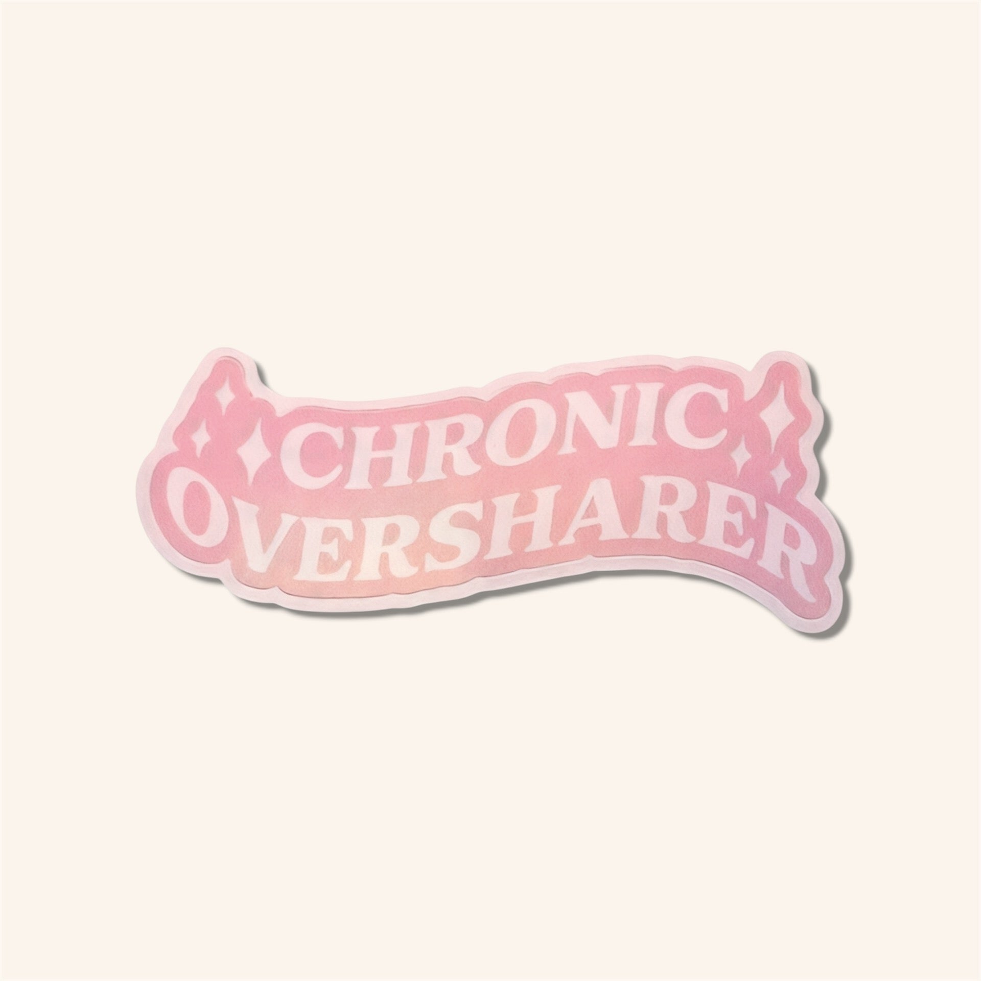 Pink sticker with 'Chronic Oversharer' text on a white background