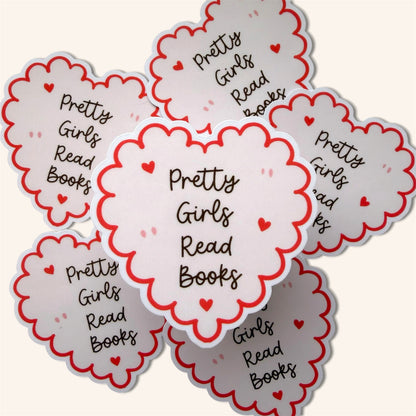 Stickers with 'Pretty Girls Read Books' text and heart designs on a white background
